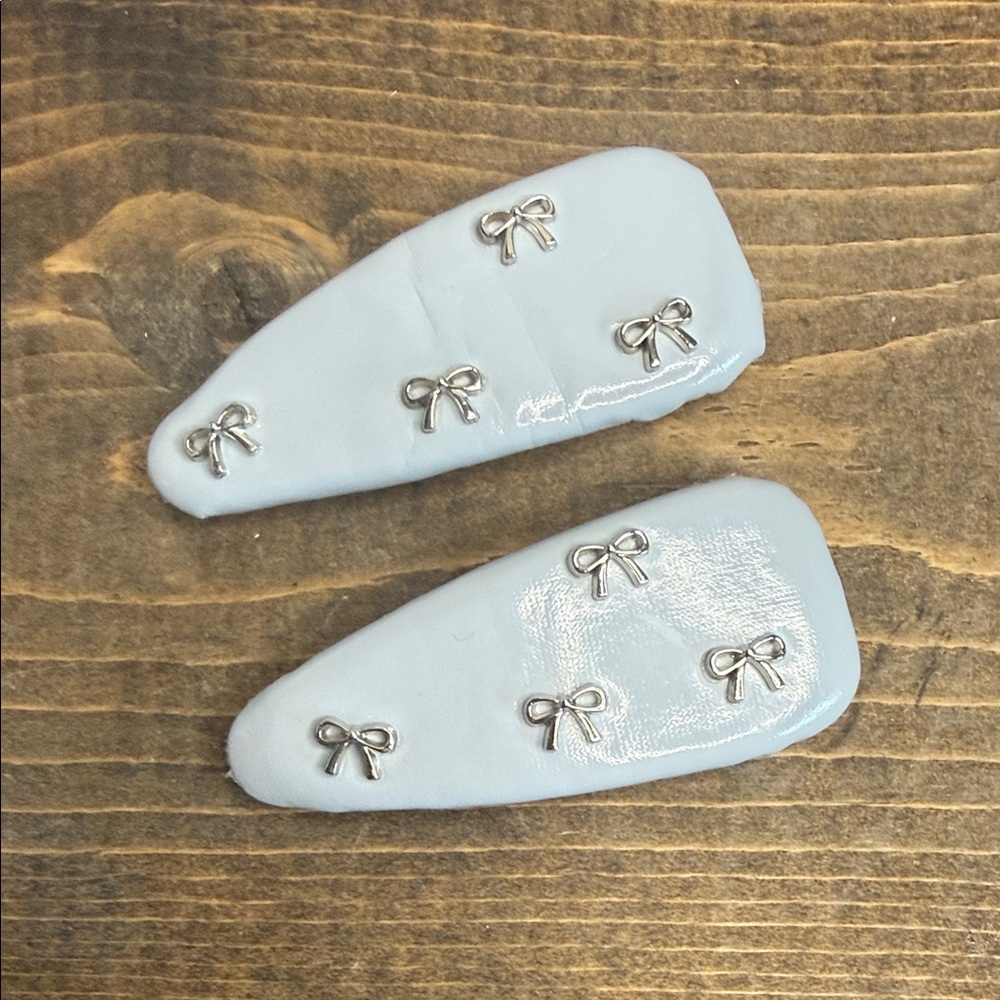 Capri Blue Patent Leather-Like & Silver Bow Accent Hair Clips